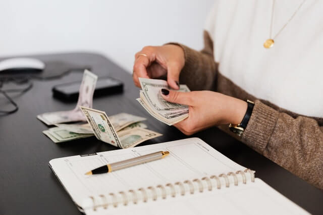 Mature couple discussing retirement plans with a financial advisor in Canada