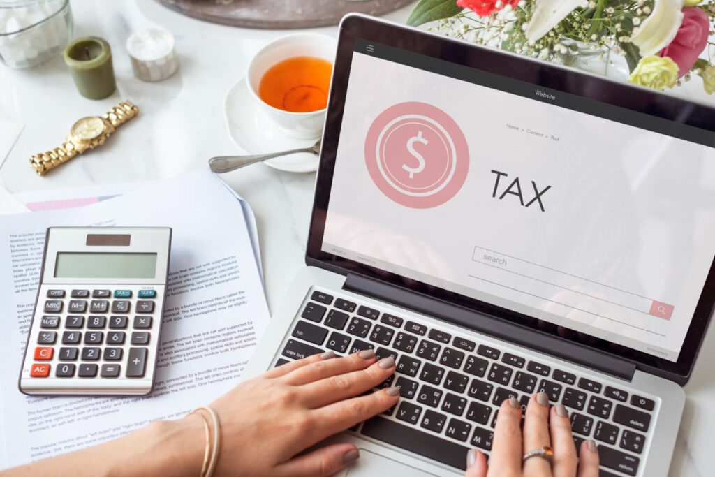 Person reviewing monthly spending and household finances in Canada