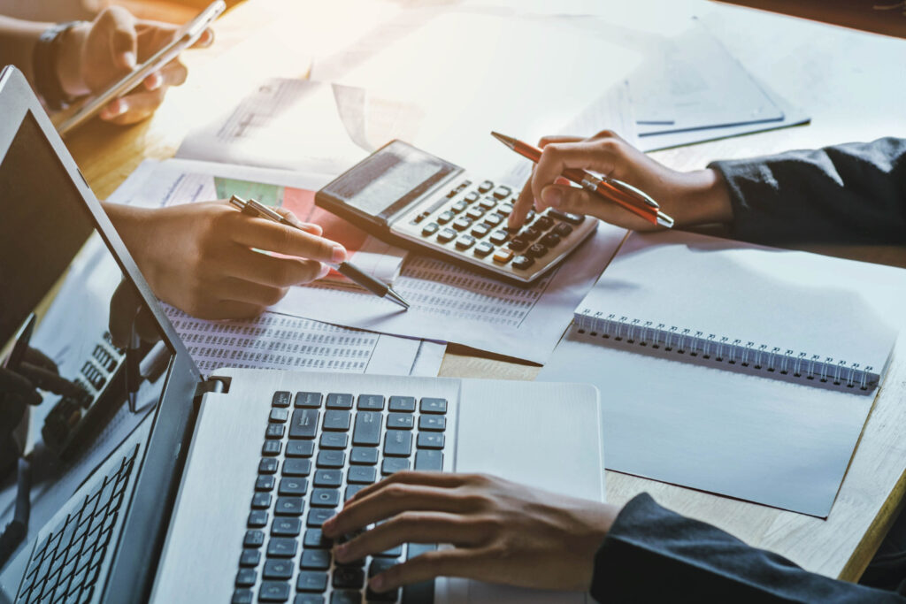 Newcomer family in Canada discussing their finances with a financial advisor